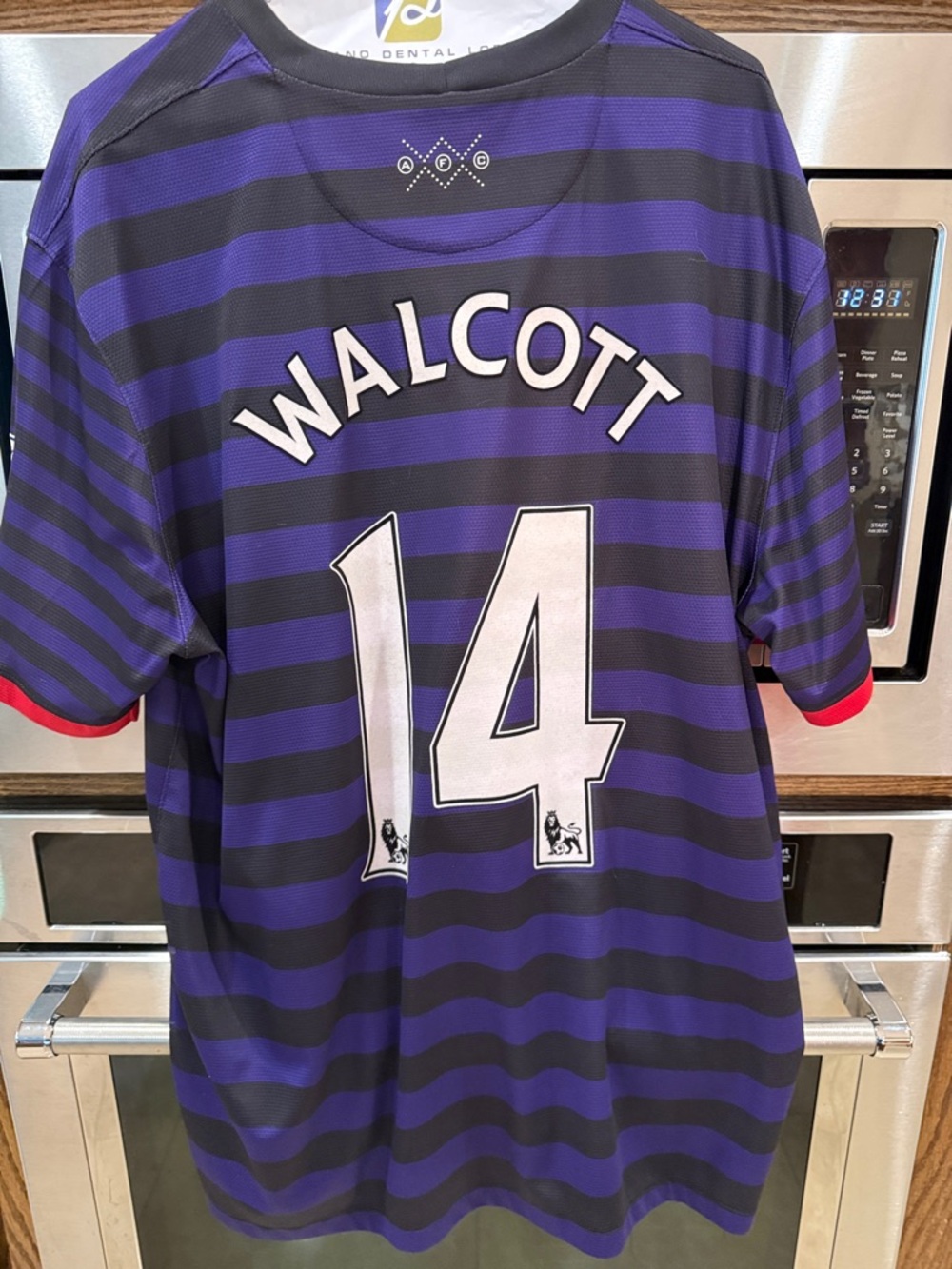 SOLD Authentic Walcott 14 Men's Purple & Black Striped Football Jersey